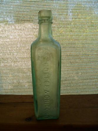 Vintage old Symington & Co green glass bottle